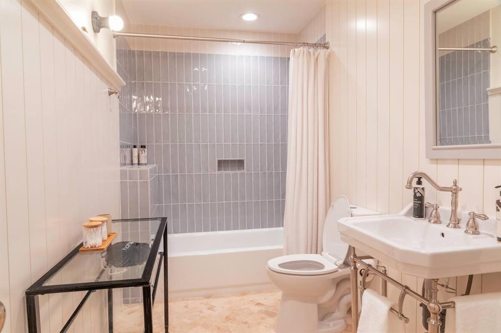 920 Cleve Cole Road Denison, TX 75021 - Photo 6 of 11 a bathroom with a sink and a mirror