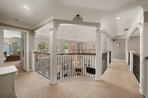 a en suite bathroom with double sink and a mirror
