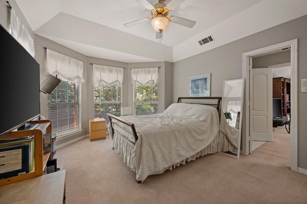 2906 Edgewood Lane Colleyville, TX 76034 - Photo 33 of 40 a bed room with a bed and a television