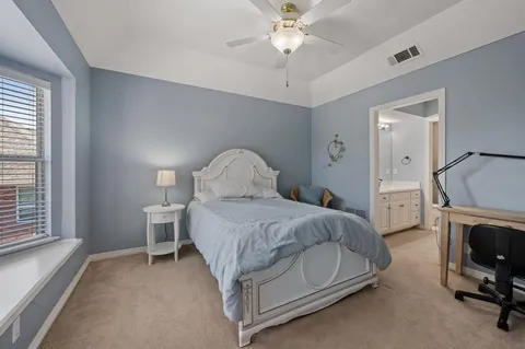 a view of a garage with cars