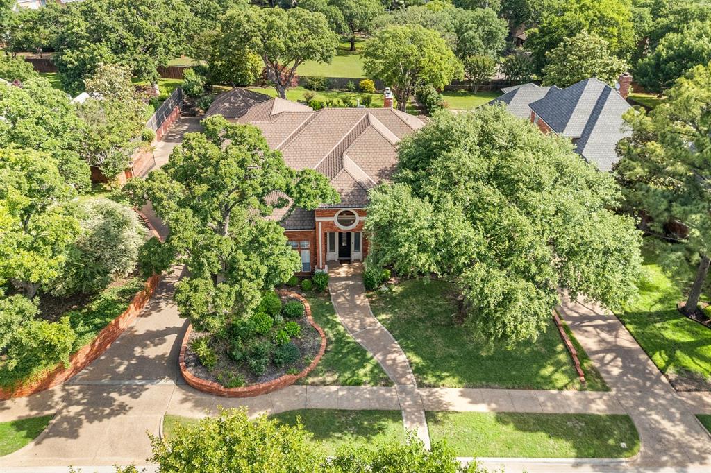 2906 Edgewood Lane Colleyville, TX 76034 - Photo 4 of 40 an aerial view of residential house with outdoor space and trees all around