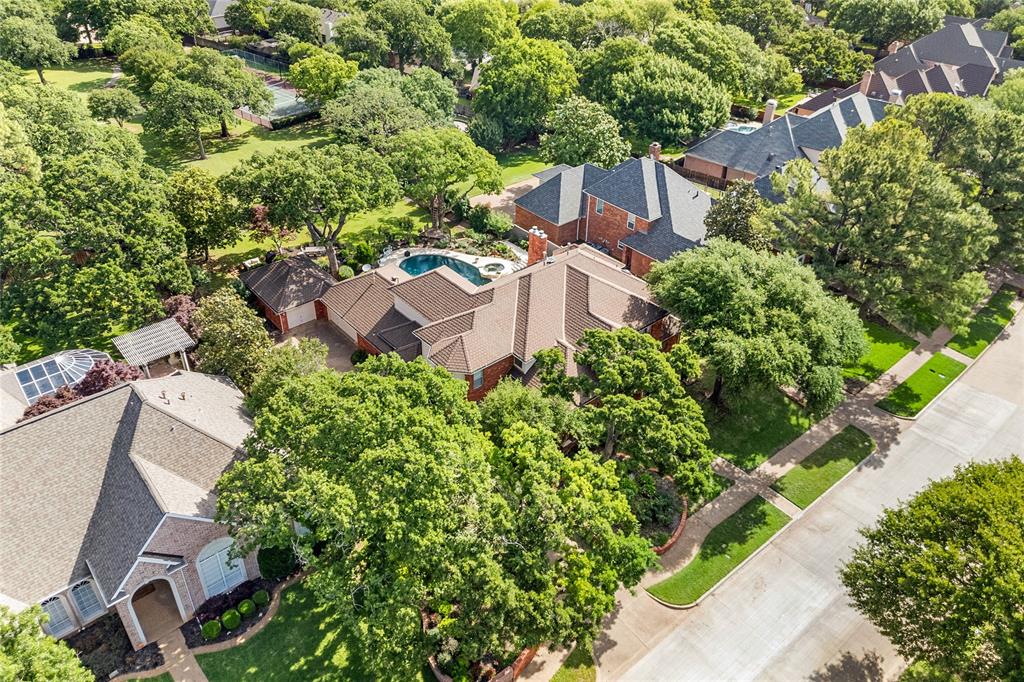 2906 Edgewood Lane Colleyville, TX 76034 - Photo 5 of 40 an aerial view of a house with a garden