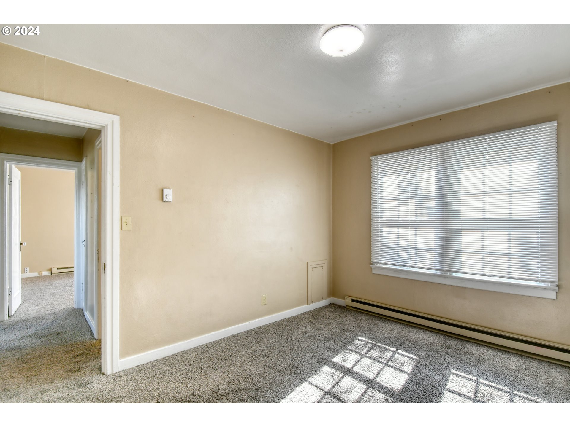1016 Southwest Goodwin Place Pendleton, OR 97801 - Photo 17 of 36 a view of an empty room and window