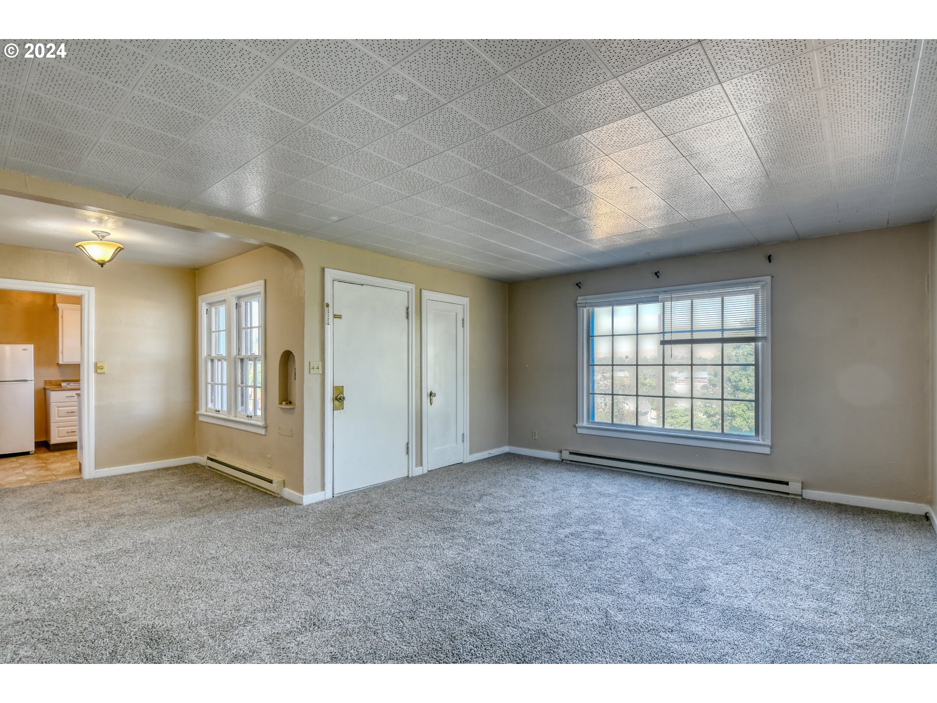 1016 Southwest Goodwin Place Pendleton, OR 97801 - Photo 5 of 36 a view of an empty room with a window