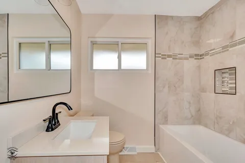a bathroom with a bathtub