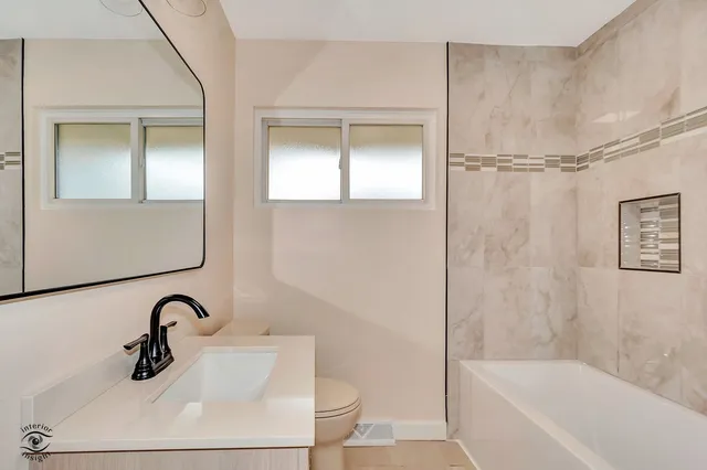 a bathroom with a bathtub