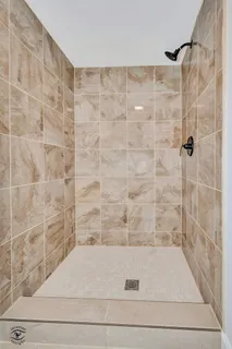 a view of a house with a tree and a yard