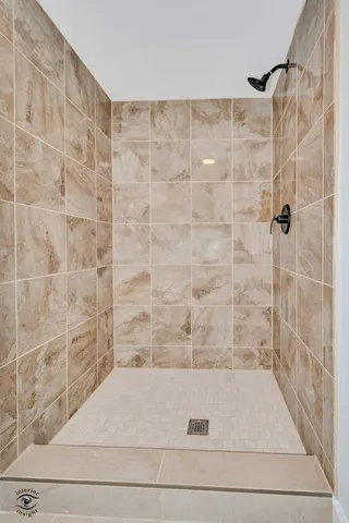 a view of a house with a tree and a yard