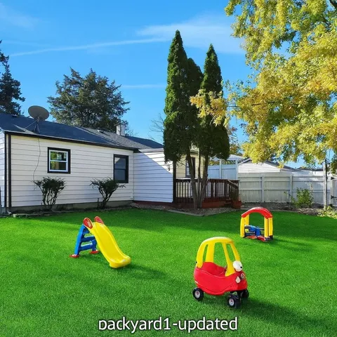 a view of a back yard of the house