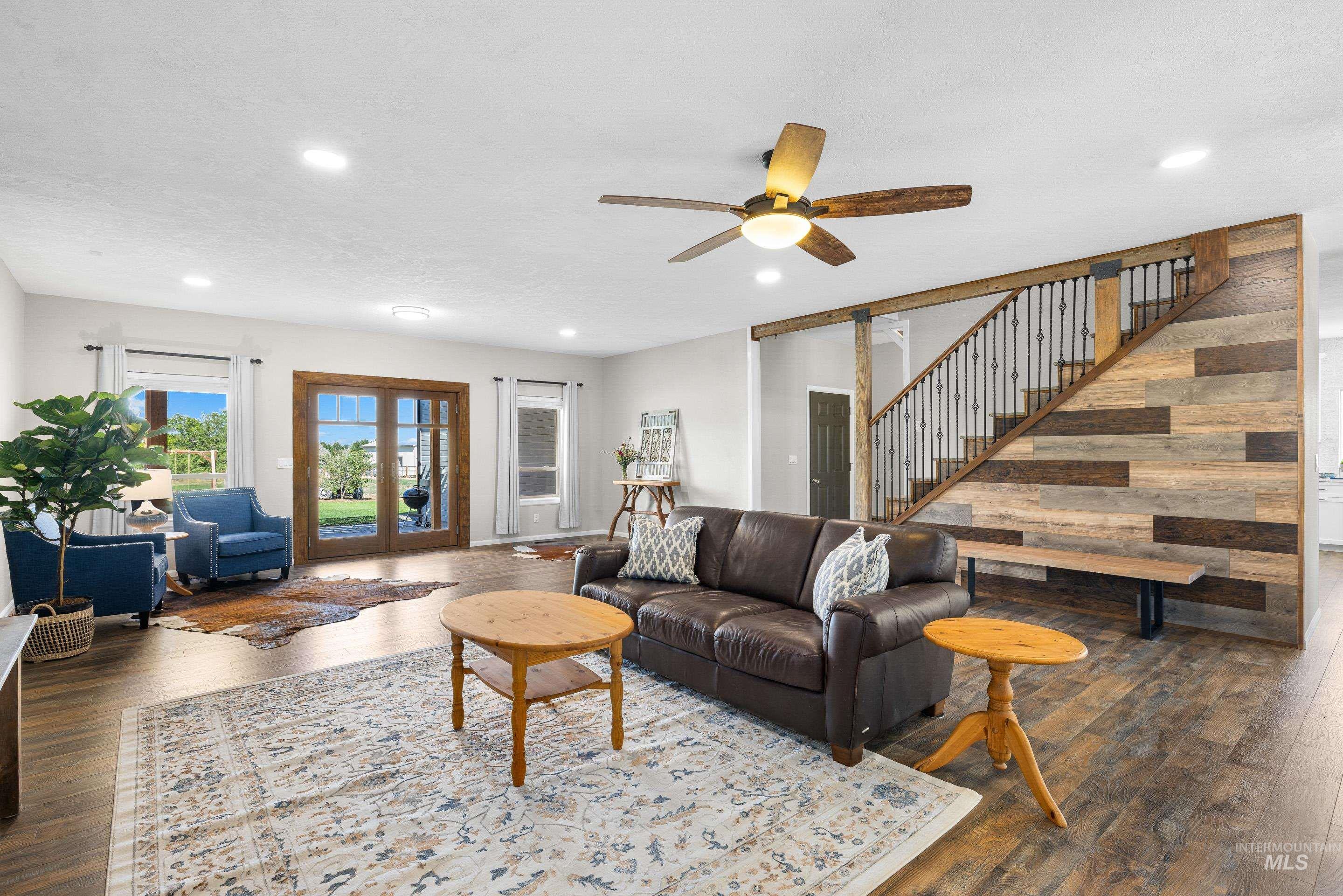 14119 Silver Ridge Road Caldwell, ID 83607 - Photo 8 of 50 Living area featuring hardwood / wood-style flooring, stairs, recessed lighting, ceiling fan, and french doors