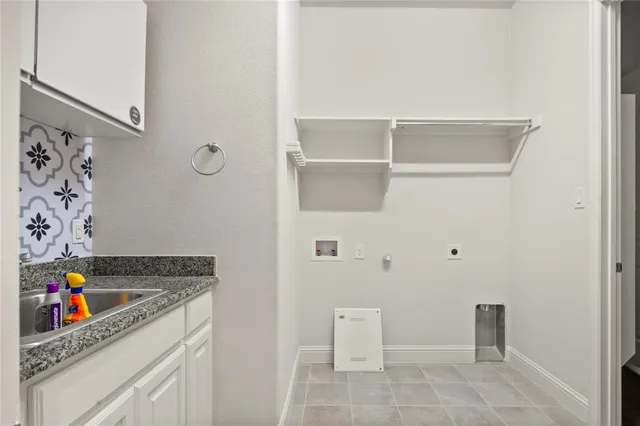 a hallway with washer and dryer