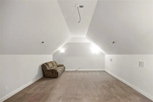 a view of room with a ceiling fan