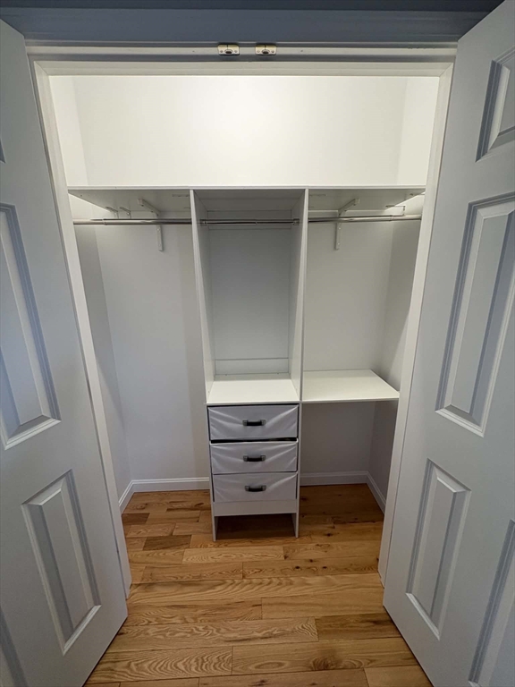 83 Comins Pond Road Warren, MA 01083 - Photo 17 of 29 a view of room with window and hardwood floor