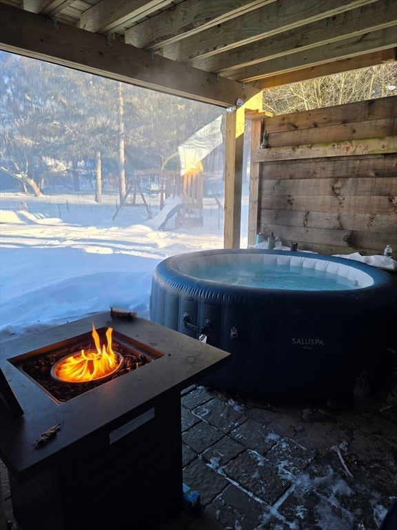 83 Comins Pond Road Warren, MA 01083 - Photo 29 of 29 a room with a sink and cabinets