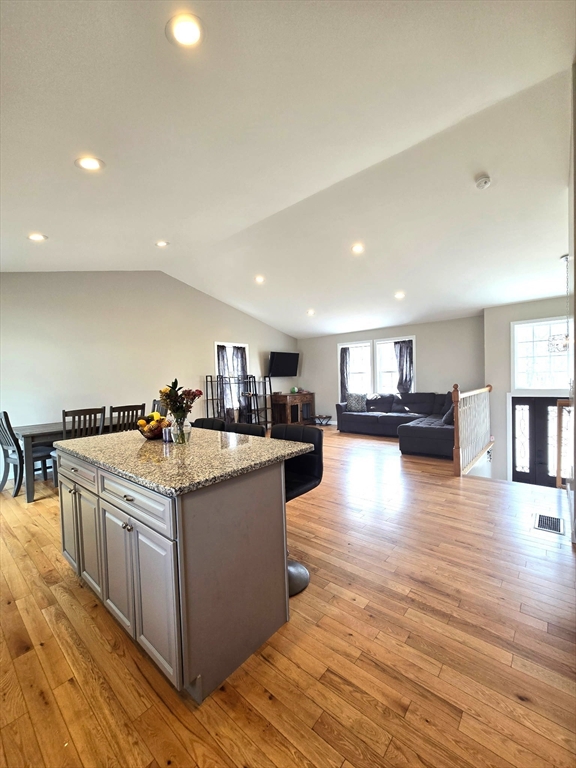 83 Comins Pond Road Warren, MA 01083 - Photo 6 of 29 a kitchen with stainless steel appliances granite countertop a stove and a refrigerator