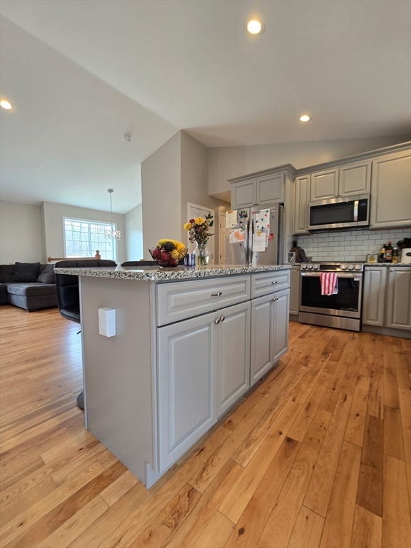 83 Comins Pond Road Warren, MA 01083 - Photo 8 of 29 a kitchen with stainless steel appliances granite countertop a sink and cabinets