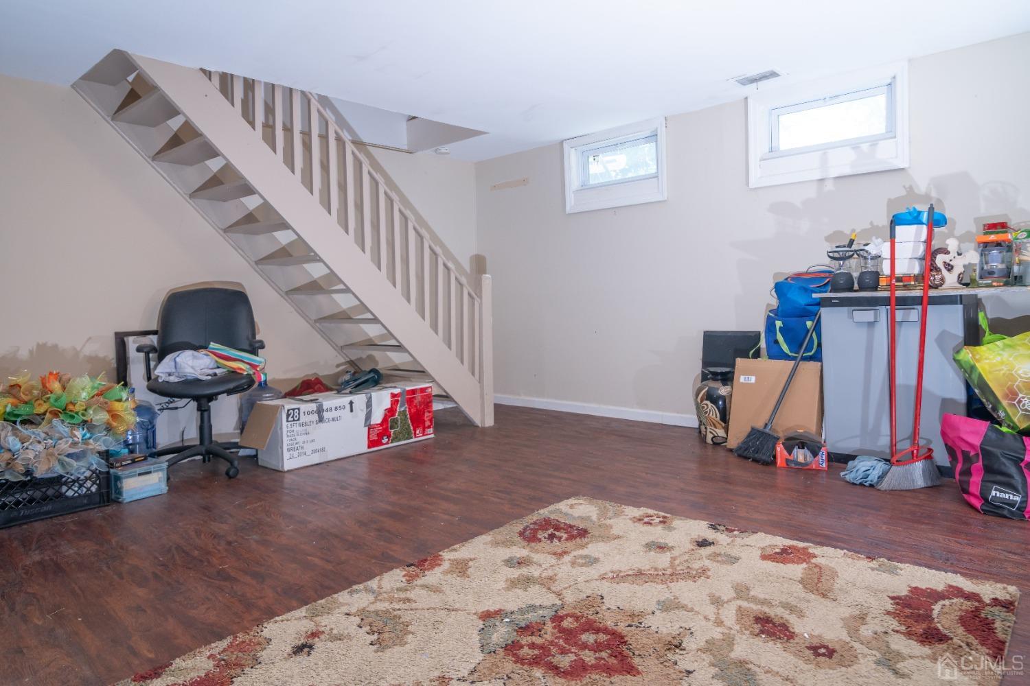 18 Columbia Road Old Bridge, NJ 08859 - Photo 14 of 24 a living room with furniture and wooden floor