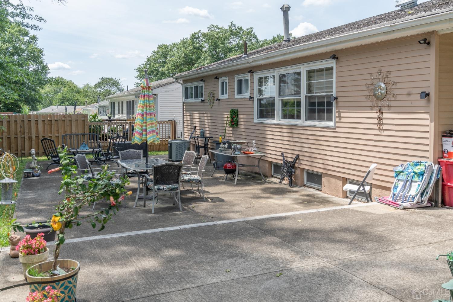 18 Columbia Road Old Bridge, NJ 08859 - Photo 20 of 24 a view of backyard with outdoor seating and plants
