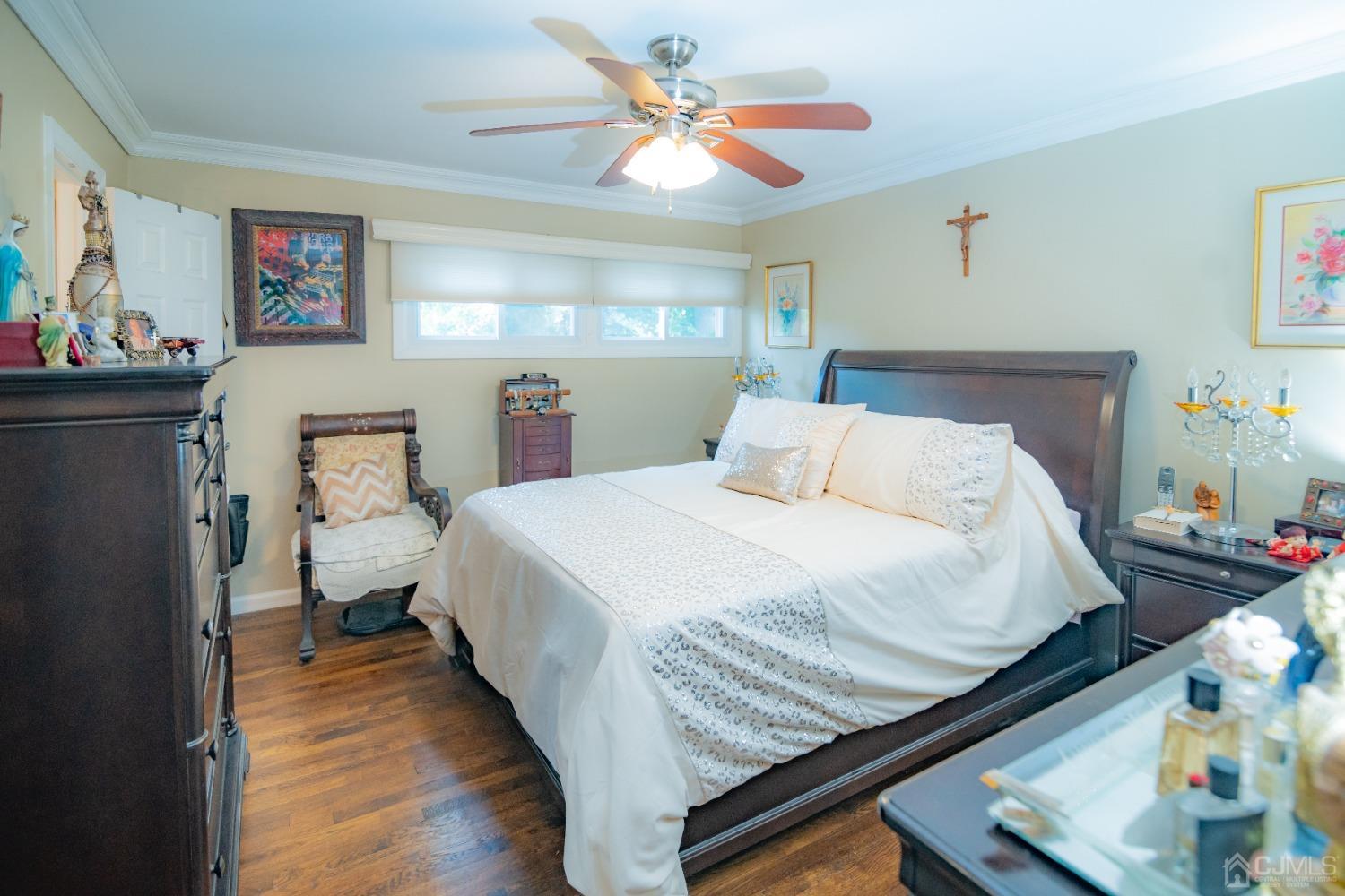 18 Columbia Road Old Bridge, NJ 08859 - Photo 8 of 24 a bedroom with a bed and wooden floor