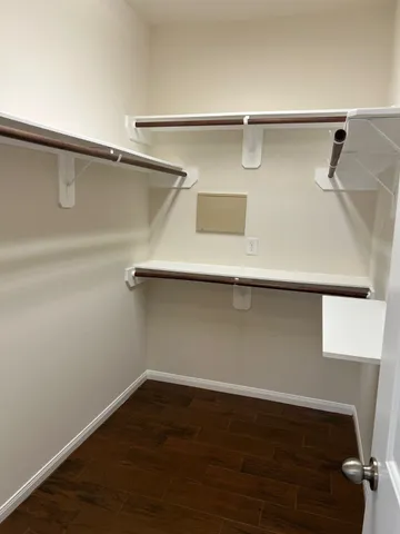 a view of a room with racks on the wall