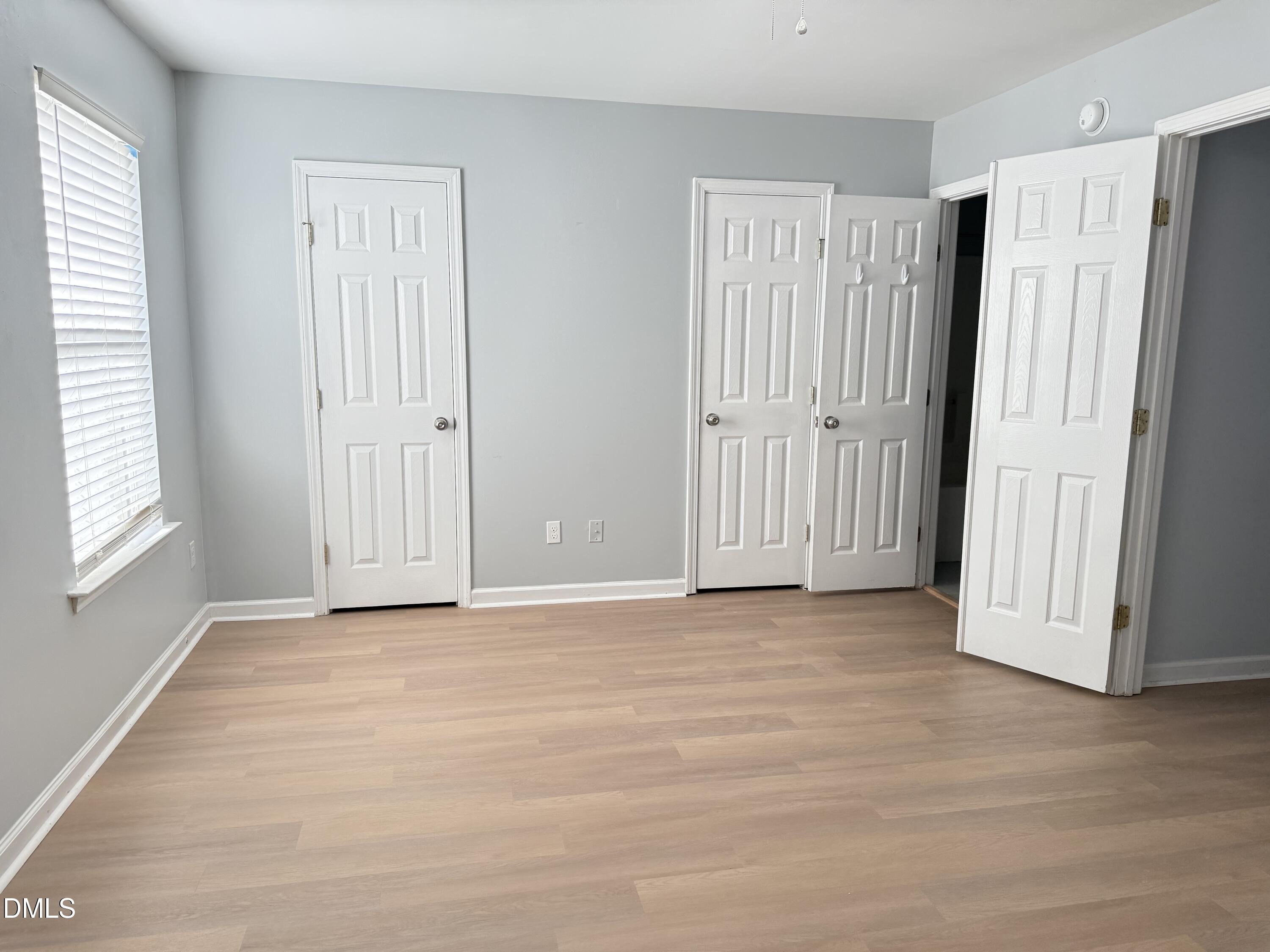 1206 Maroon Drive Durham, NC 27713 - Photo 11 of 20 a view of an empty room with closet area