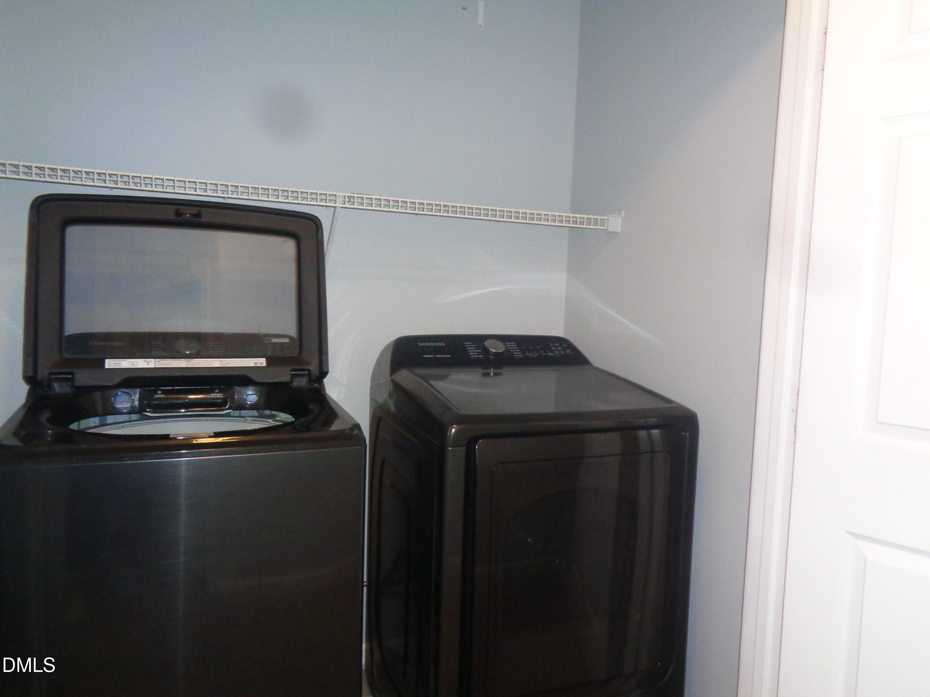 1206 Maroon Drive Durham, NC 27713 - Photo 18 of 20 a utility room with dryer and washer