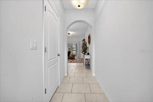 a view of a livingroom from a hallway