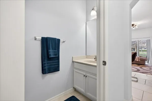 a bathroom with a shower and a sink