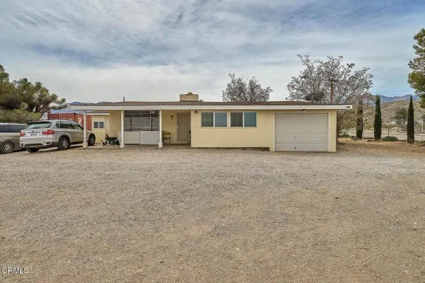 front view of house with car parked