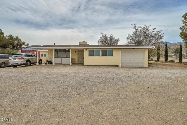 front view of house with car parked