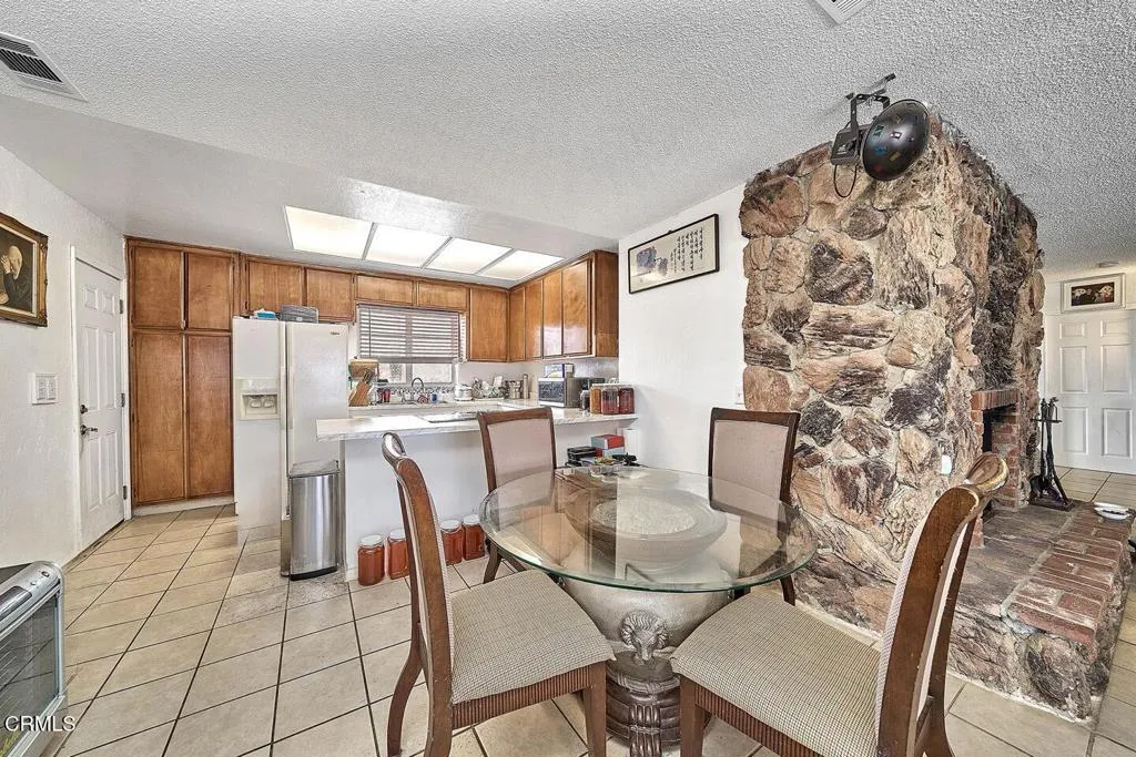 9125 Mesa Road Lucerne Valley, CA 92356 - Photo 13 of 55 a view of a dining room with furniture