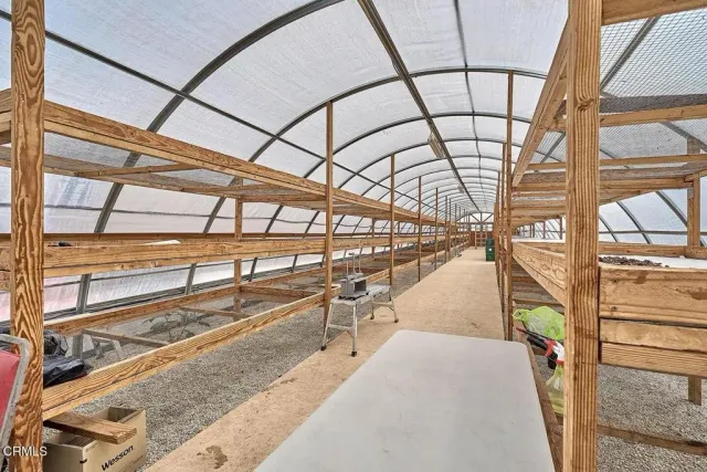 a view of a swimming pool with a porch
