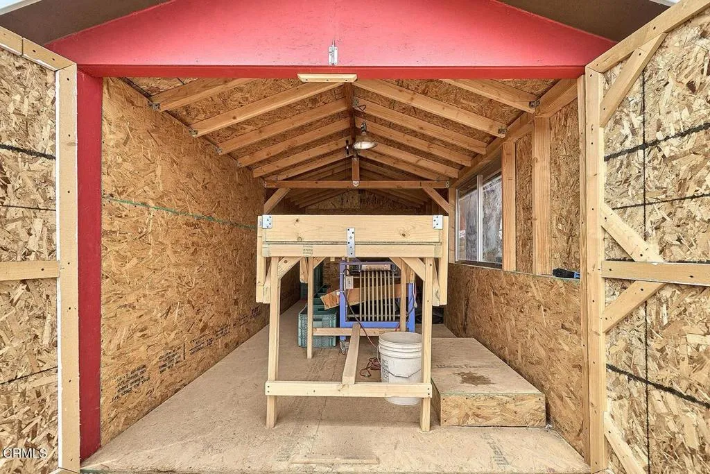 9125 Mesa Road Lucerne Valley, CA 92356 - Photo 18 of 55 a view of entryway with an empty room and wooden floor
