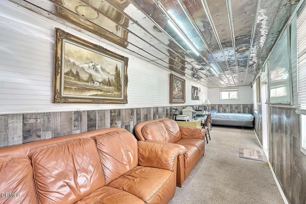 9125 Mesa Road Lucerne Valley, CA 92356 - Photo 21 of 55 a bedroom with furniture and a large window