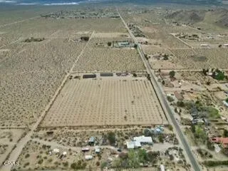 a view of a lake with sitting area