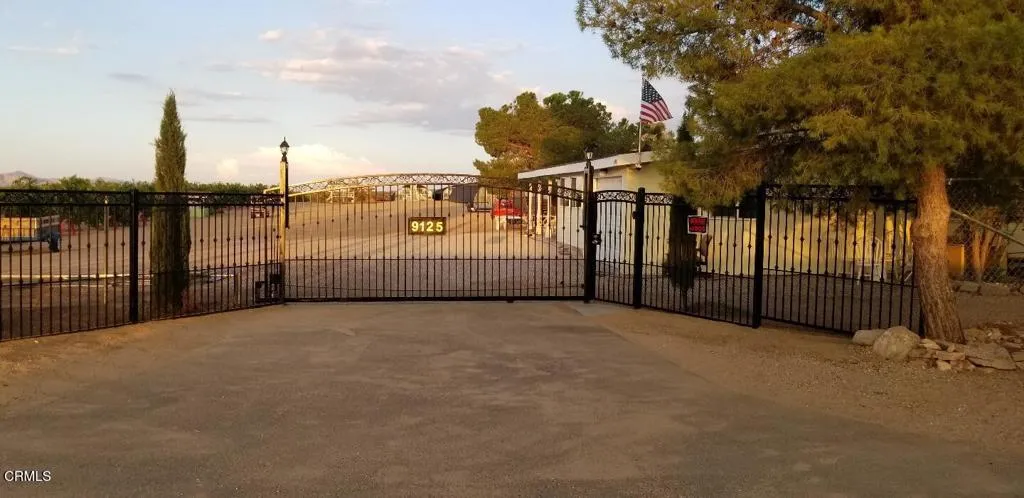 9125 Mesa Road Lucerne Valley, CA 92356 - Photo 50 of 55 a view of a wrought fence