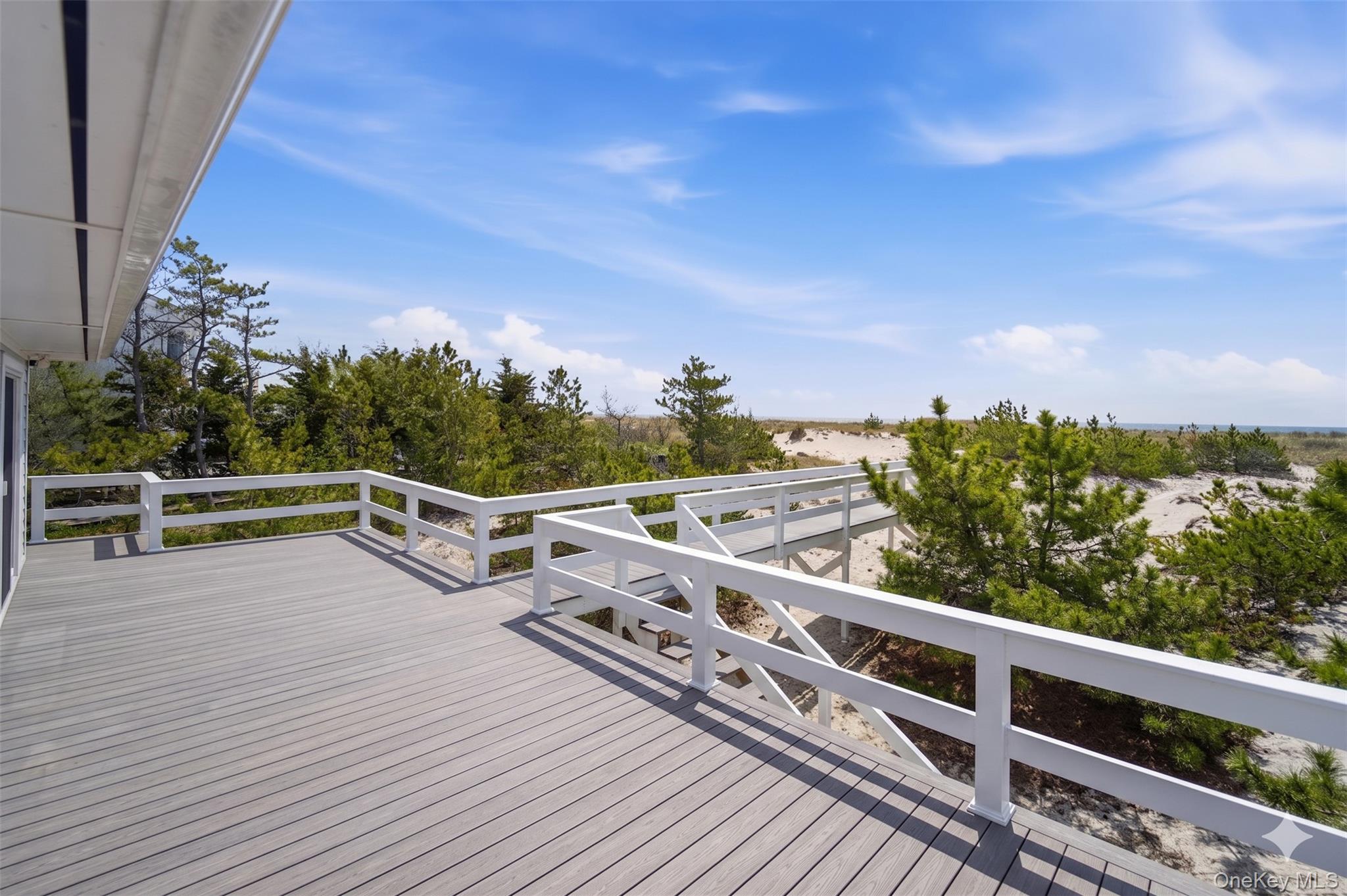 355 Dune Road Westhampton Beach, NY 11978 - Photo 16 of 16 DIGITALLY ENHANCED. New Deck being built