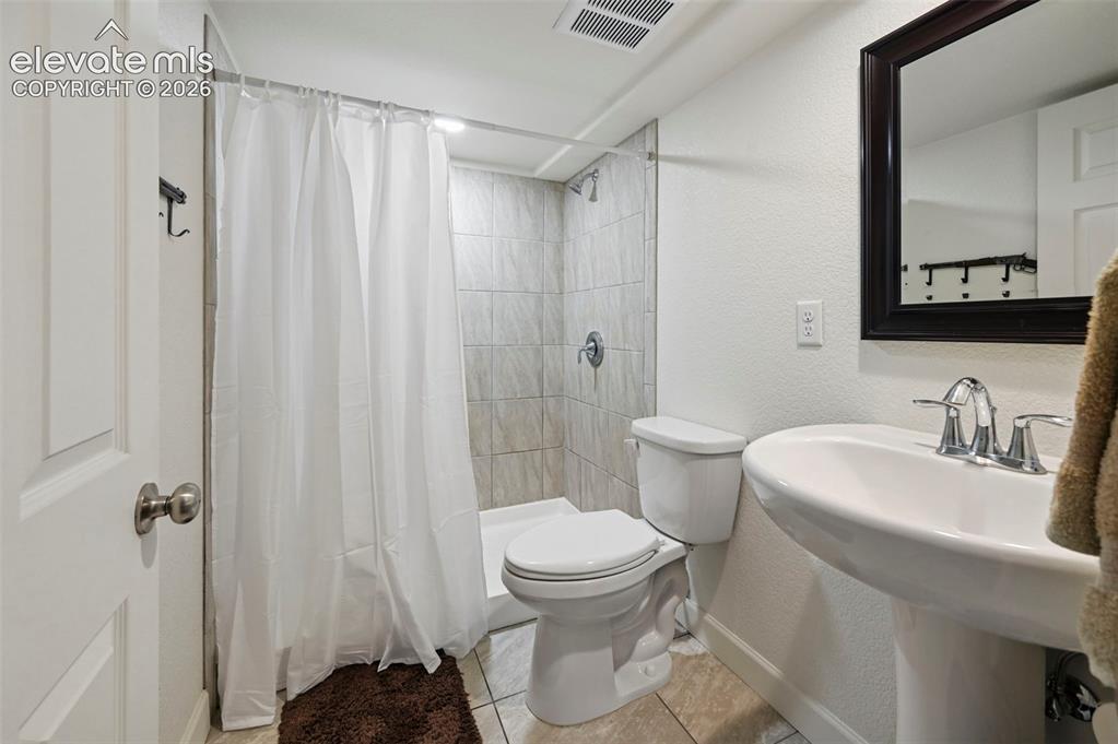 40051 Cold Iron Road Rush, CO 80833 - Photo 33 of 50 3/4 bathroom attached to Bedroom 5 in Basement
