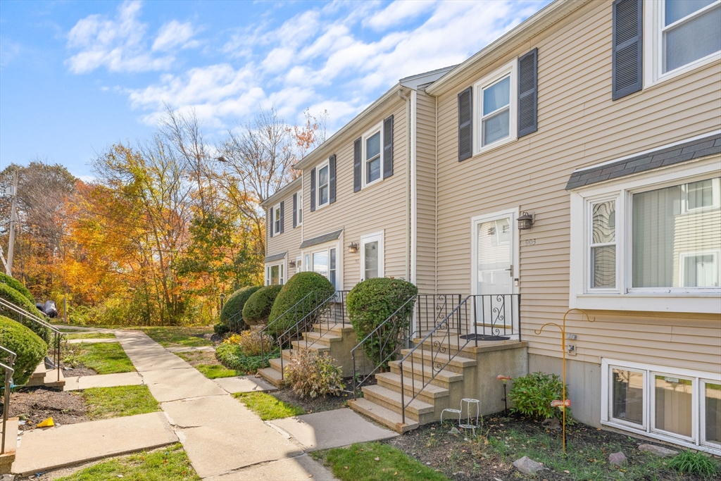 902 Irving Road, Unit 902 Randolph, MA 02368 - Photo 3 of 22 a view of a house with backyard