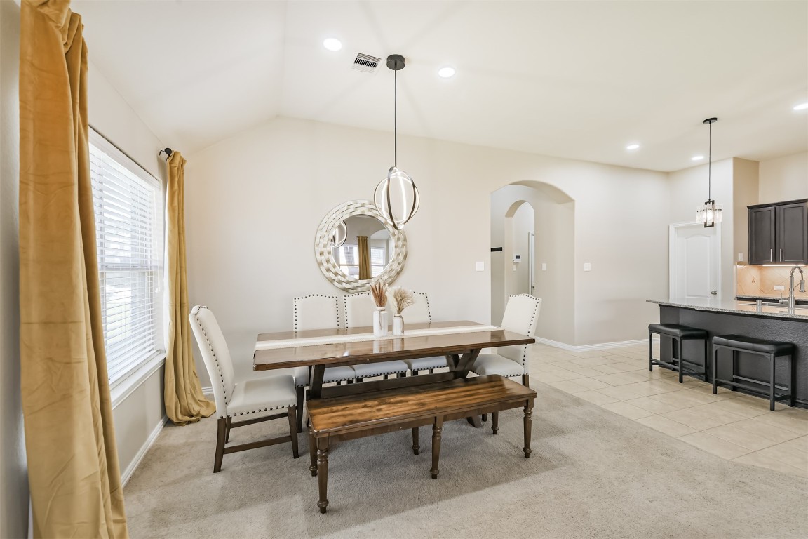 9622 Invergarry Way Tomball, TX 77375 - Photo 14 of 32 a living room with furniture a table and a potted plant