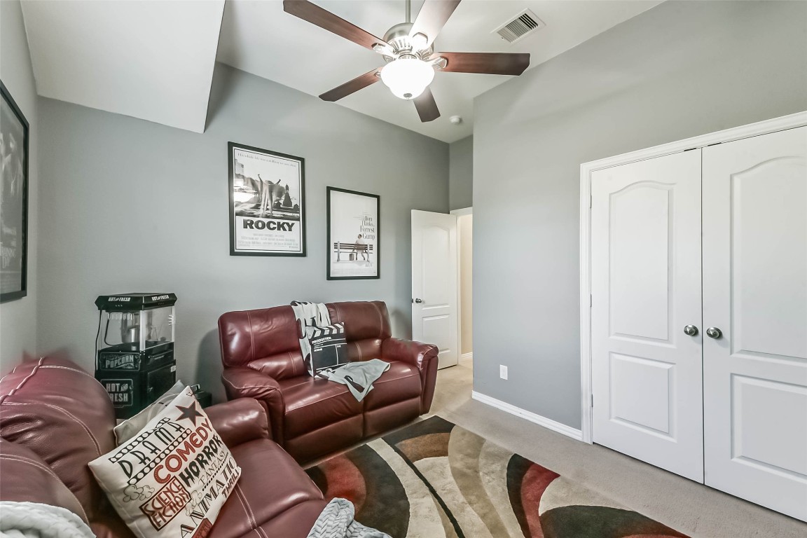 9622 Invergarry Way Tomball, TX 77375 - Photo 27 of 32 a living room with furniture and a ceiling fan