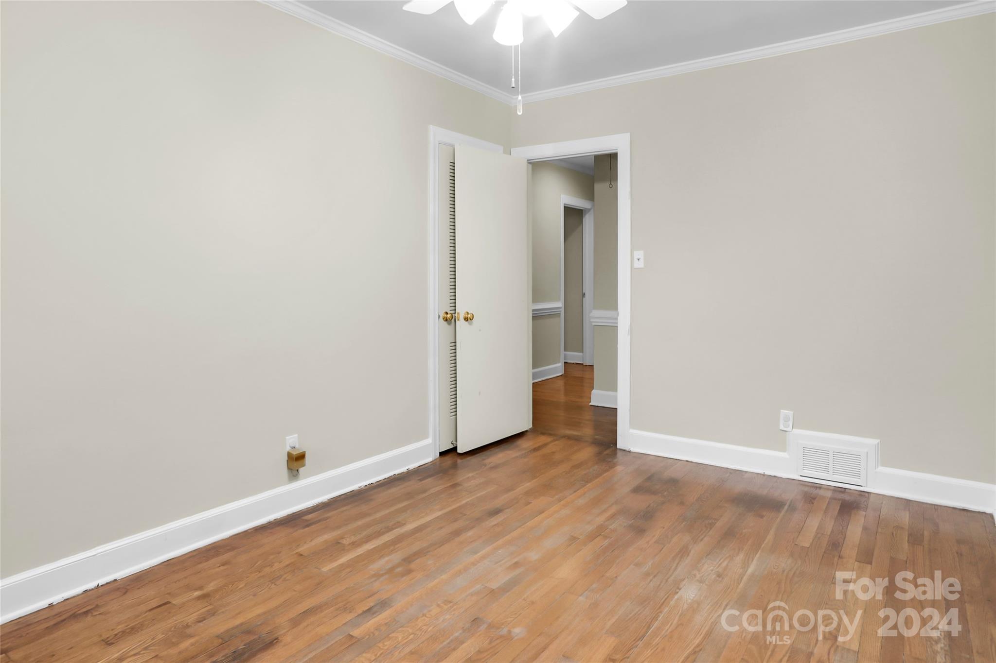 1408 Sterling Road Charlotte, NC 28209 - Photo 22 of 28 a view of an empty room with wooden floor
