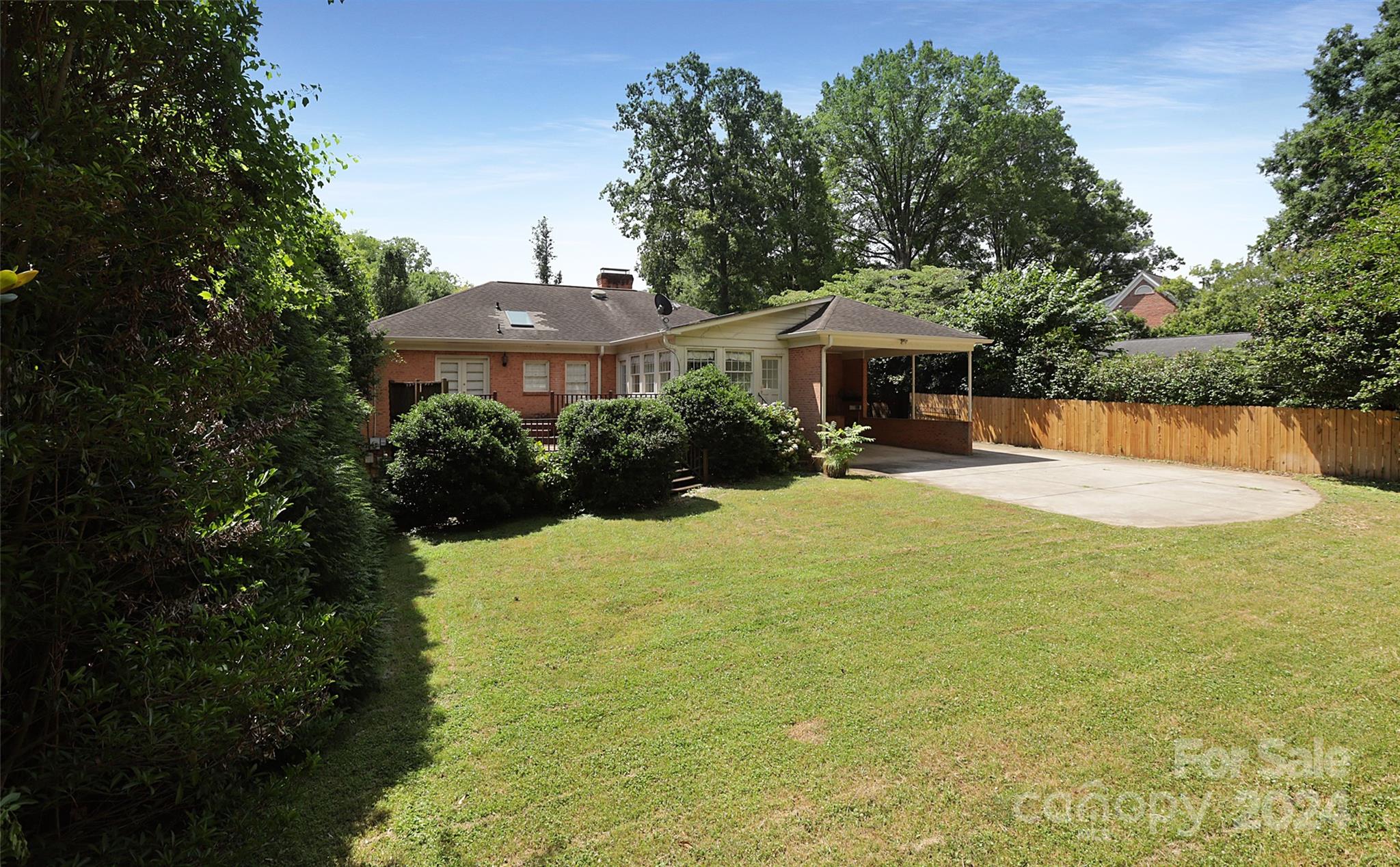 1408 Sterling Road Charlotte, NC 28209 - Photo 25 of 28 a front view of a house with a yard