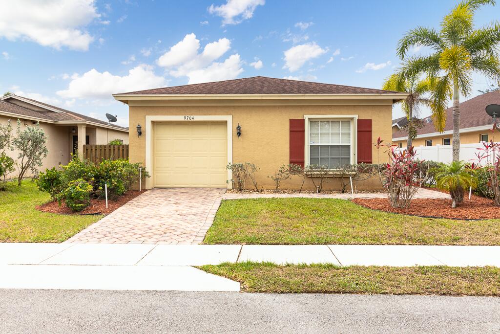 9704 Windrift Circle Fort Pierce, FL 34945 - Photo 1 of 19 Outside Front