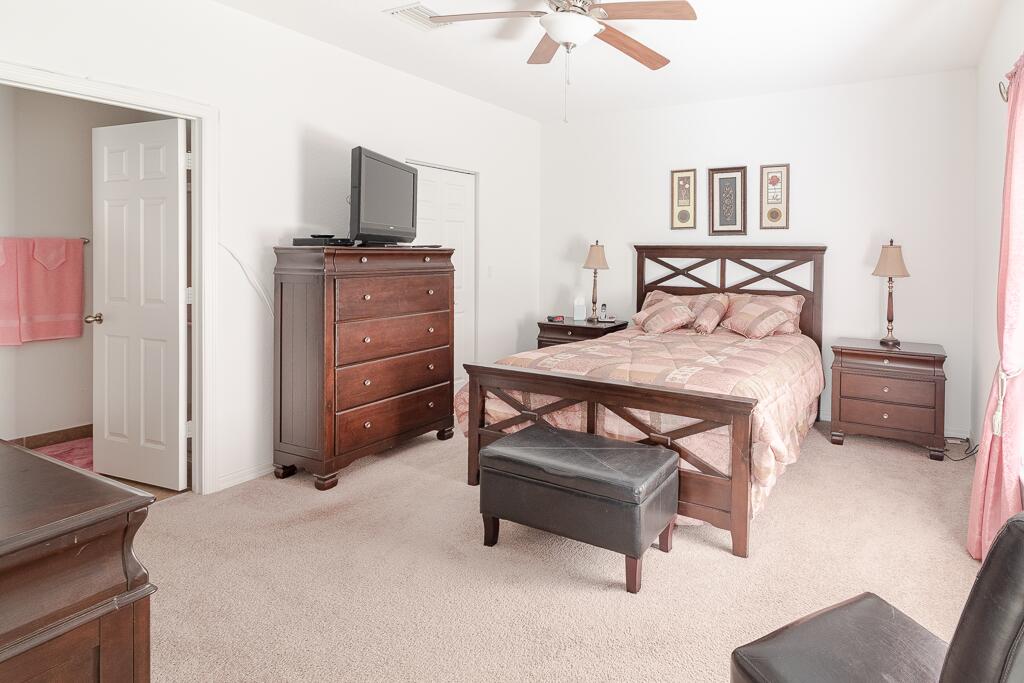 9704 Windrift Circle Fort Pierce, FL 34945 - Photo 11 of 19 Master Bedroom