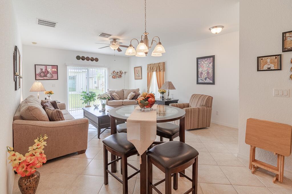 9704 Windrift Circle Fort Pierce, FL 34945 - Photo 3 of 19 Dining and Living Area