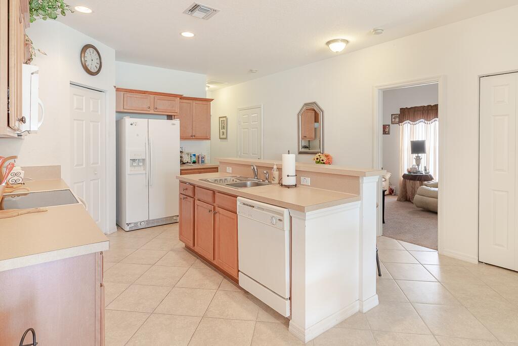 9704 Windrift Circle Fort Pierce, FL 34945 - Photo 7 of 19 Kitchen