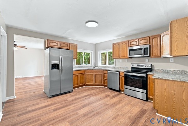 865 Sulphur Spring Road Prospect, VA 23960 - Photo 14 of 40 Kitchen featuring wood-finish flooring, stainless