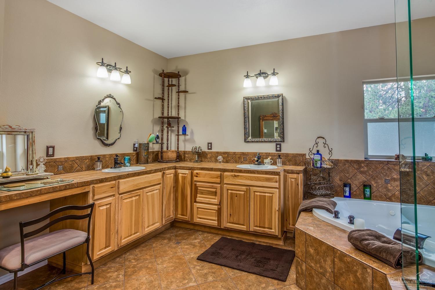 19257 Indian Summer Road Bend, OR 97702 - Photo 23 of 25 Master bath with hickory cabinets and so