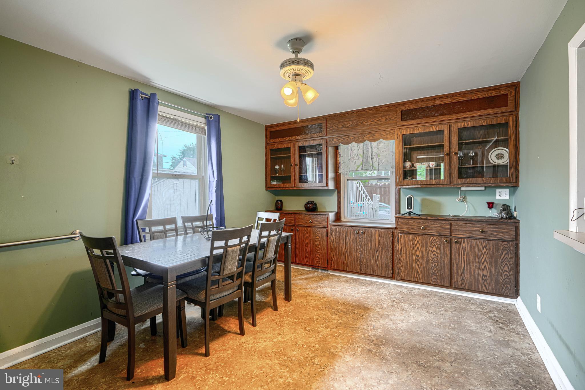 1842 Dunmere Road Baltimore, MD 21222 - Photo 11 of 37 Dining room with Built in wall shelving unit